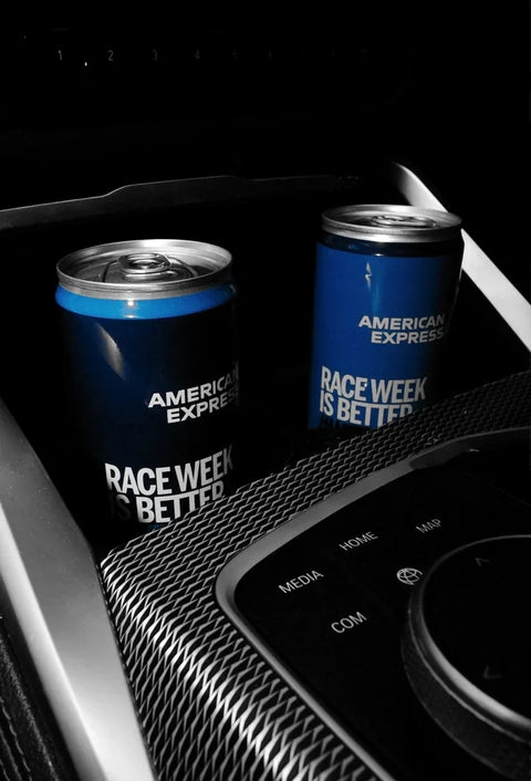 American Express cans in the console of a car