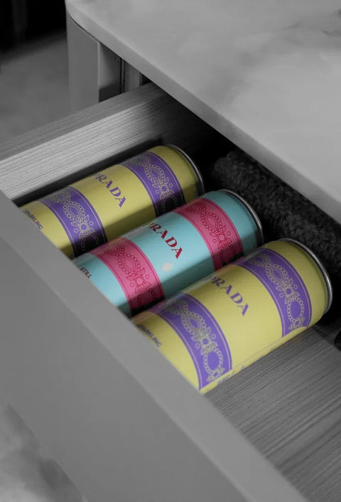 Prada cans in a drawer
