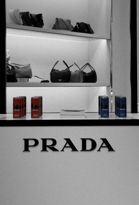 Prada cans on the drinks cart in a Prada store