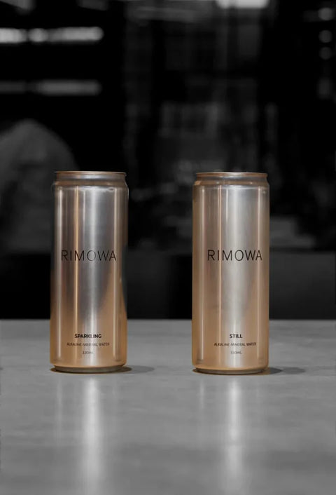 RIMOWA cans on a counter in store