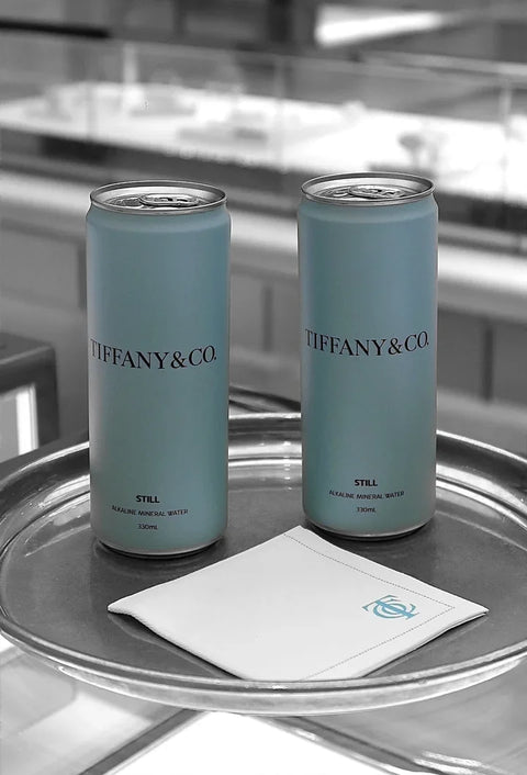 Tiffany & Co cans on a tray in a Tiffany store